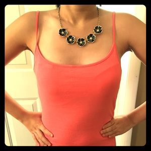 Black flower necklace.